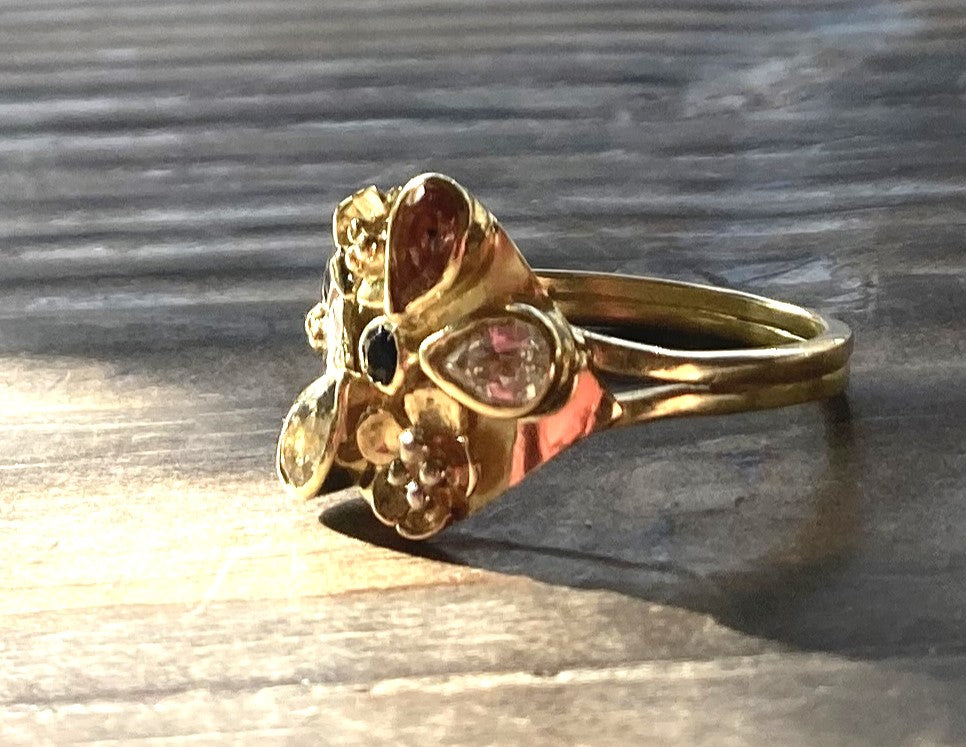pear shape sapphires 18ct yellow gold flower cluster cocktail ring, on wood