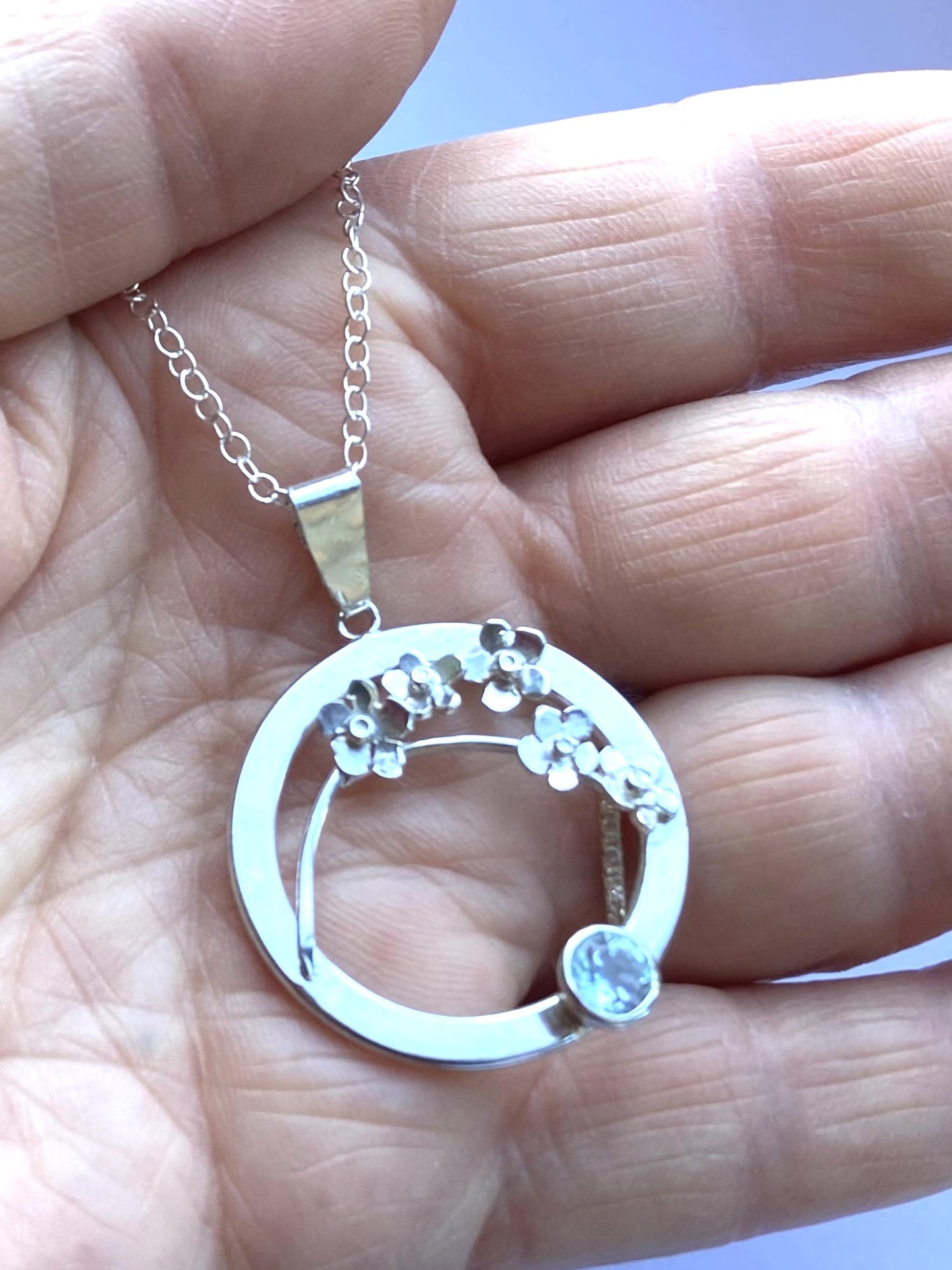 Blue Topaz Forget-me-Not Sprig Circle Pendant