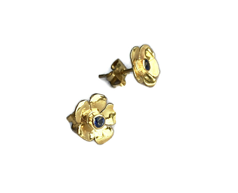 yellow gold floral sapphire earrings with large scroll fittings, on white background