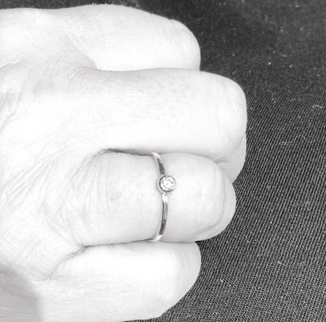 diamond solitaire 18ct yellow gold ring worn on hand