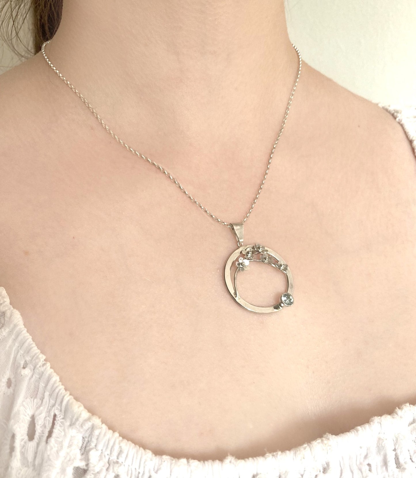 Forget-me-Not floral pendant set with blue topaz