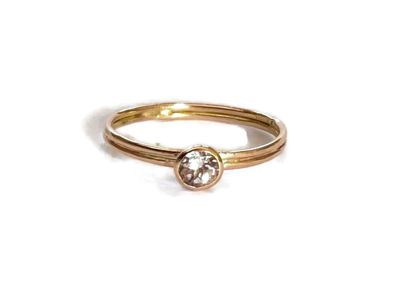 morganite and rose gold twin shank ring on white background