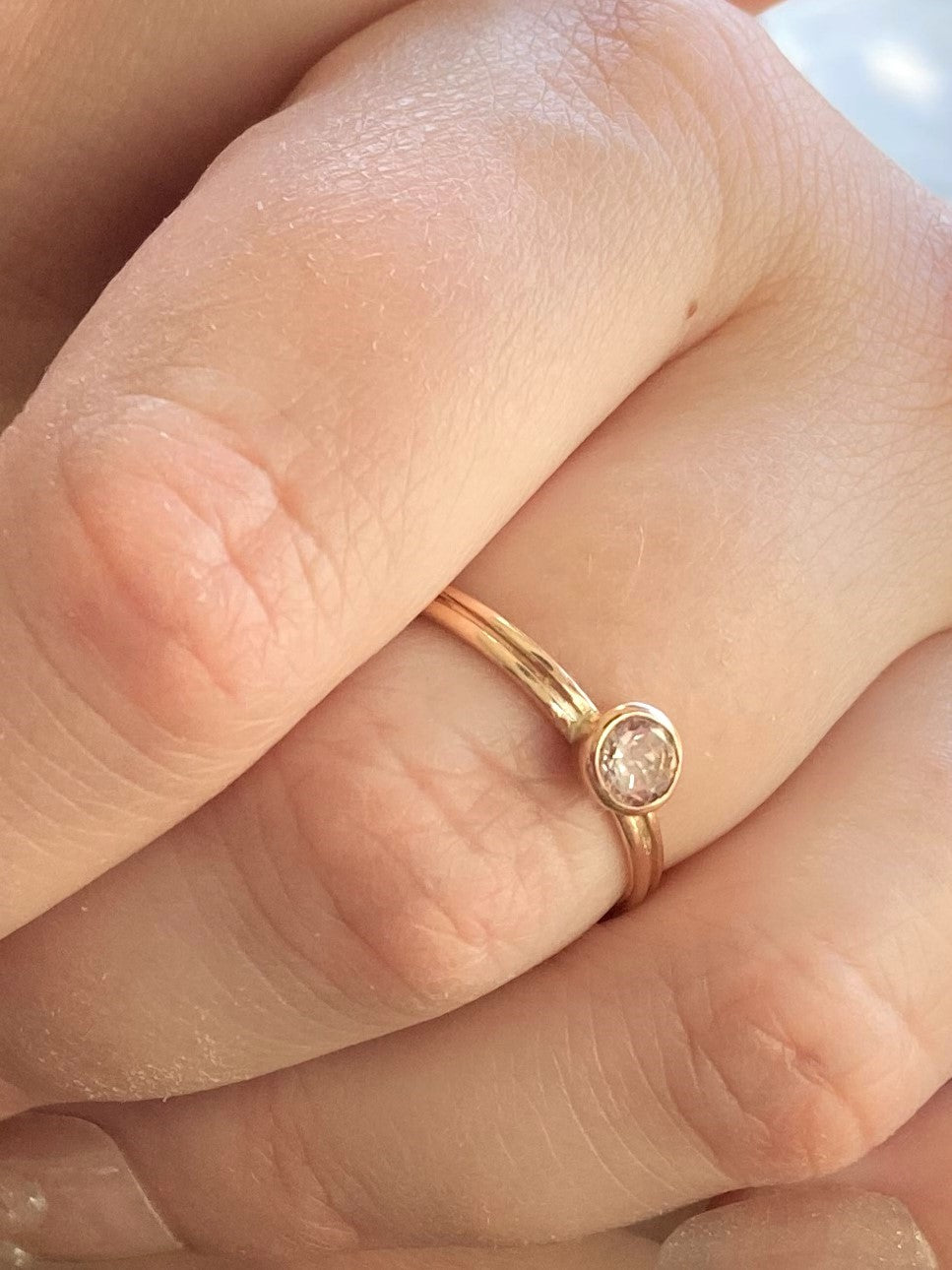 rose gold twin shank pink morganite ring on ladies fingers