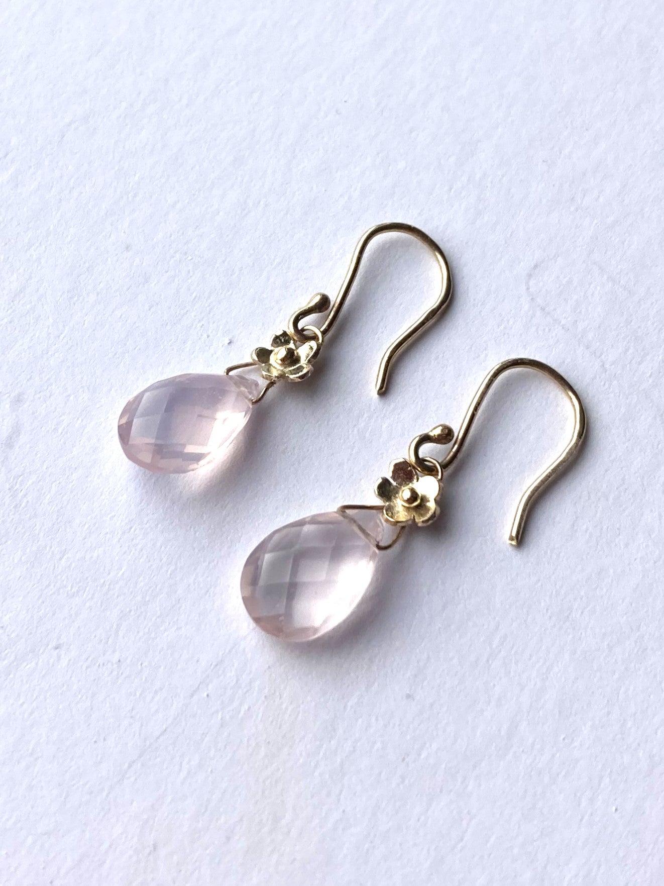 floral gold drop earrings with chequerboard rose quartz. on white background