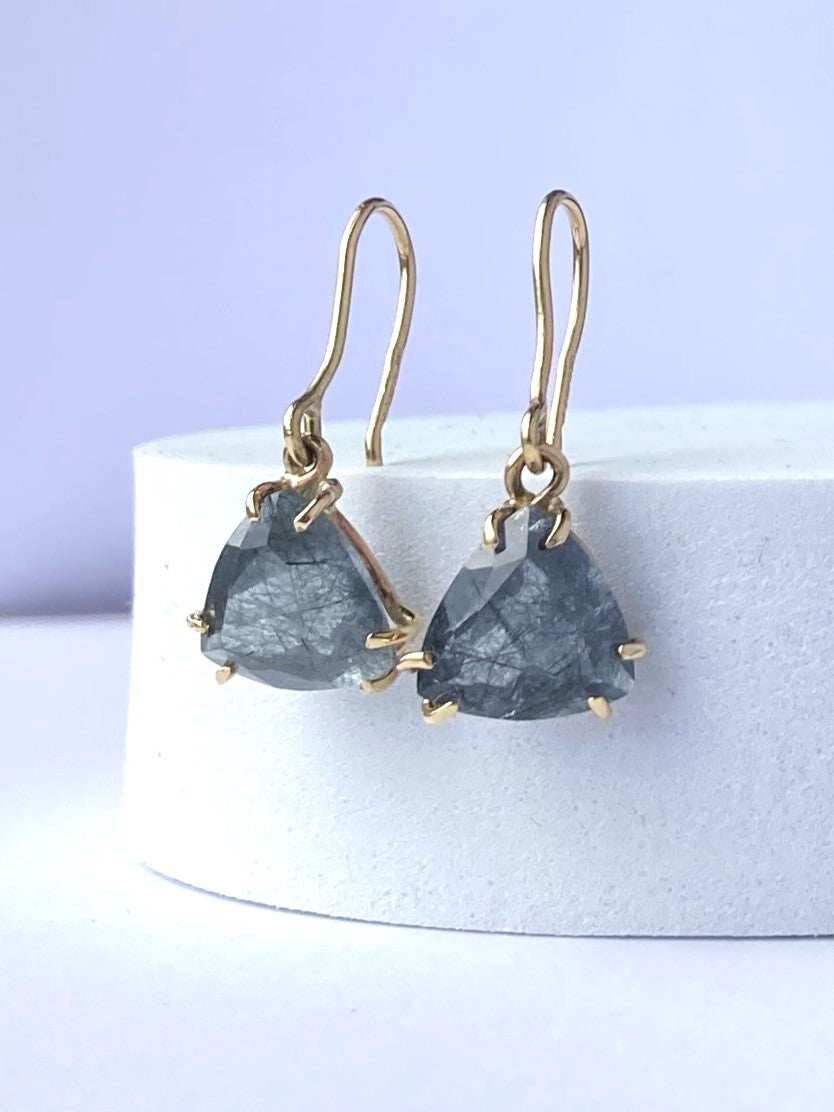 trillion shape gold prong setting rutilated quartz drop earrings on white background