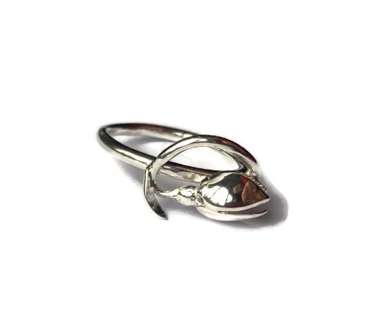 art nouveau style handmade silver snowdrop ring, on white background