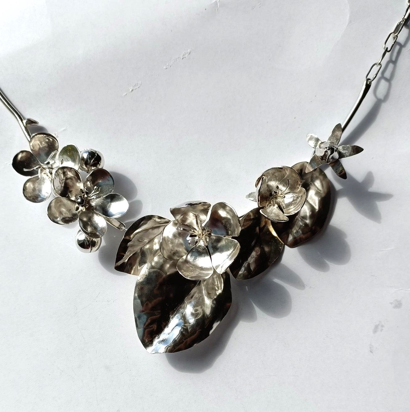 silver life size floral occasion statement necklace, on white background
