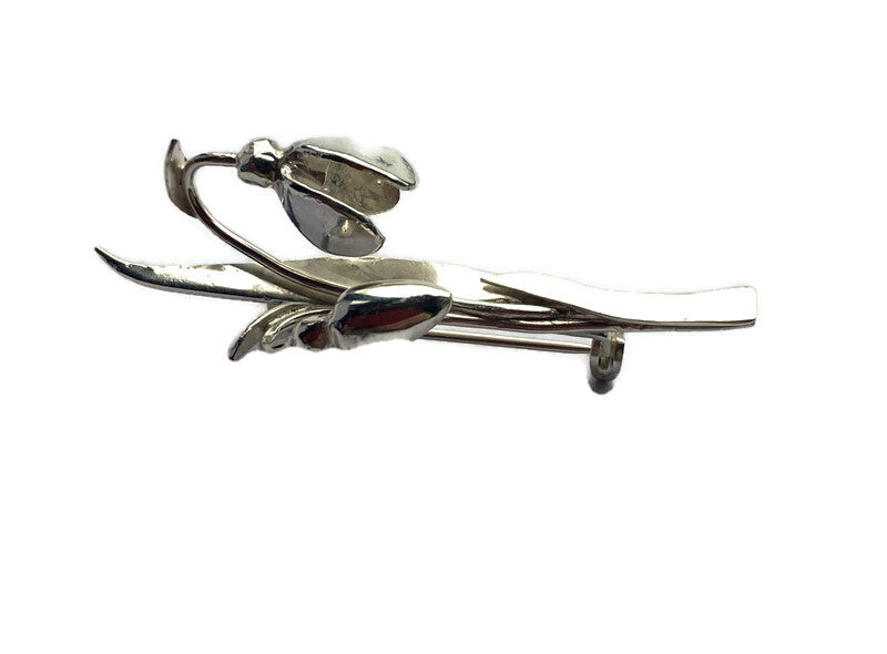 Botanical silver snowdrop flower brooch by Kim Styles Jewellery on a white background
