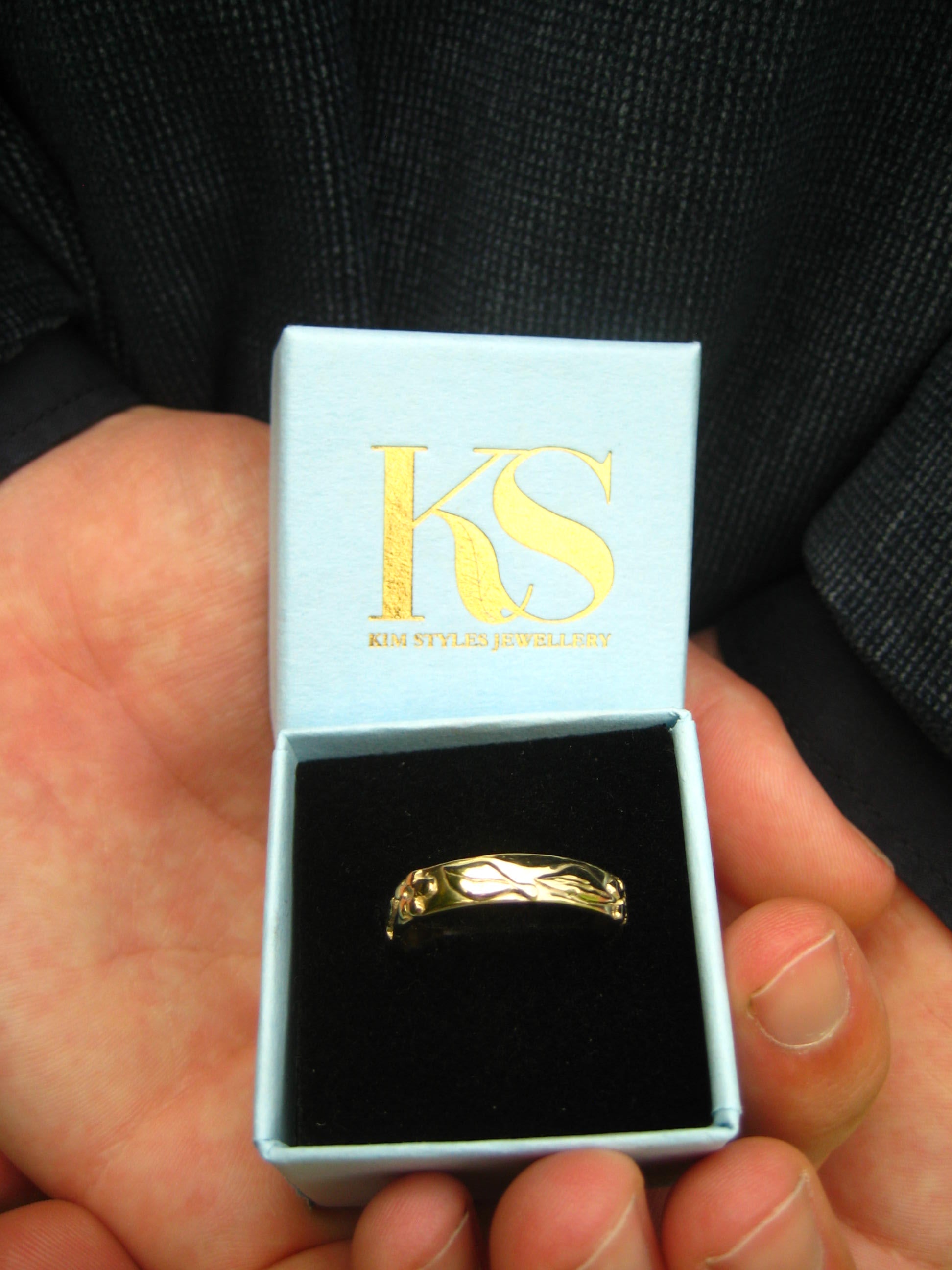 yellow gold floral wedding ring in pale blue box with Kim Styles Jewellery logo in gold