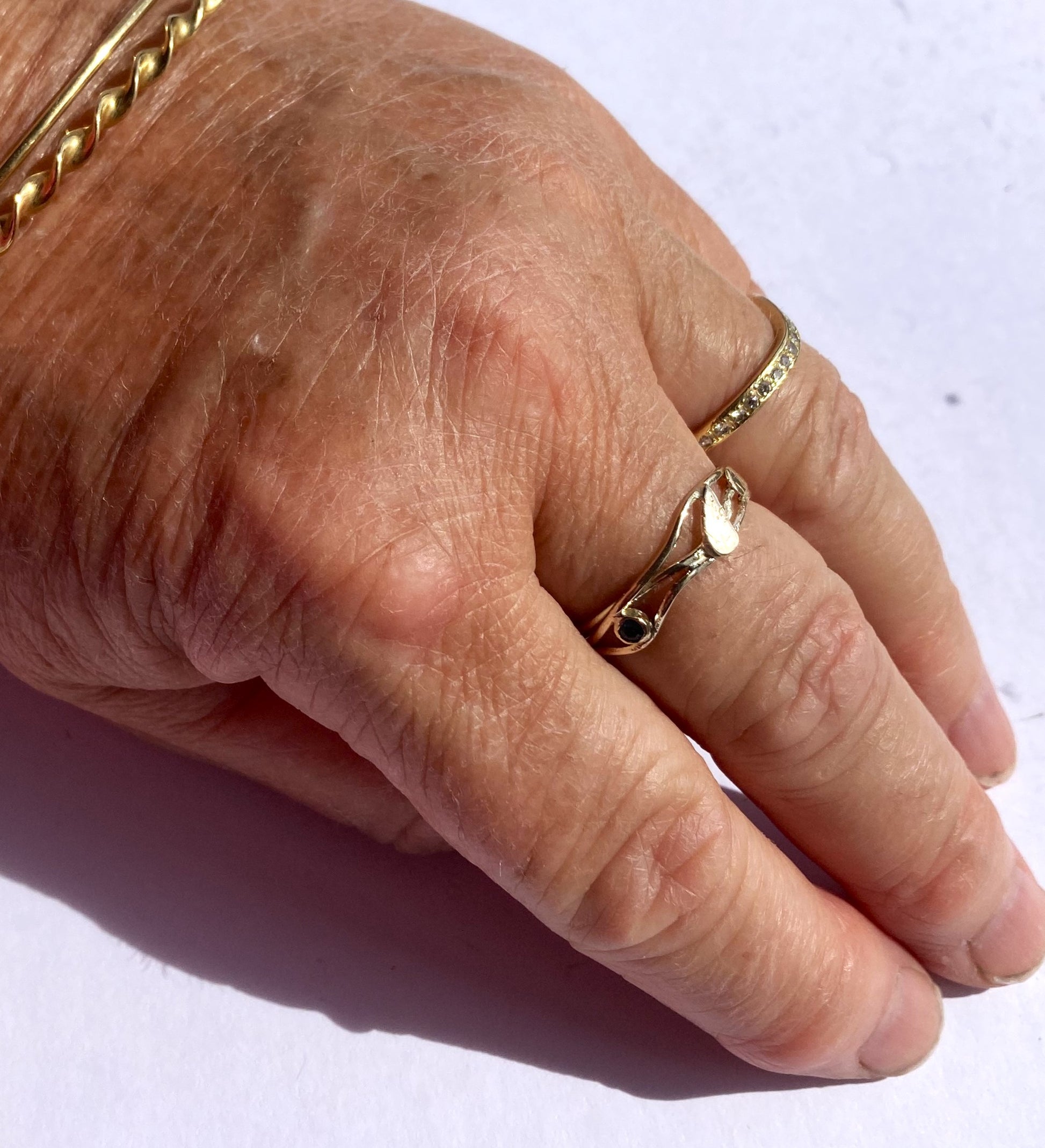 gold leaf ring on hand