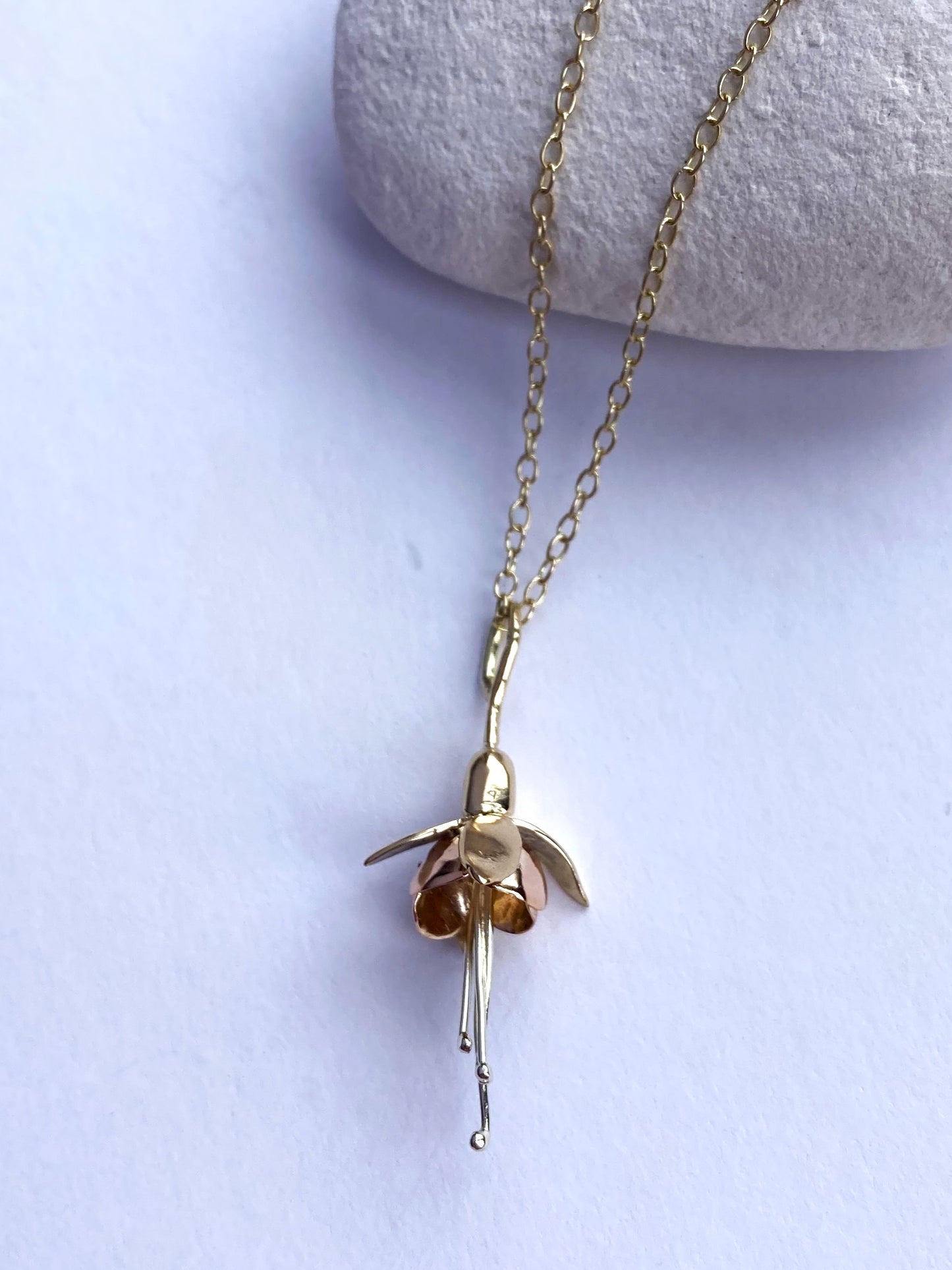 tiny gold floral fuchsia necklace on gold chain