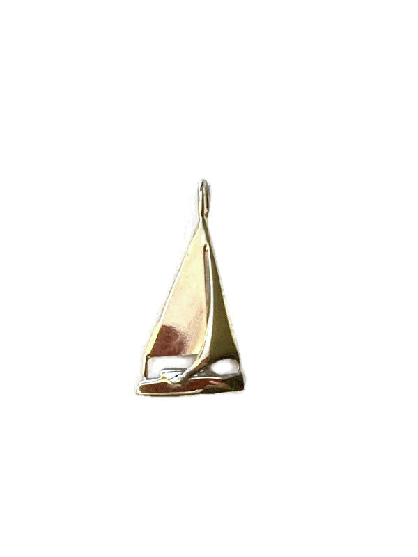 A polished gold sailing yacht pendant, shown on a plain white background with a soft drop shadow.