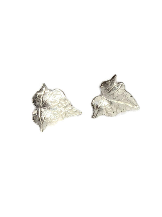 A pair of silver ivy leaf stud earrings on a plain white background.
