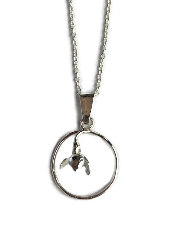 small snowdrop circle pendant on white background