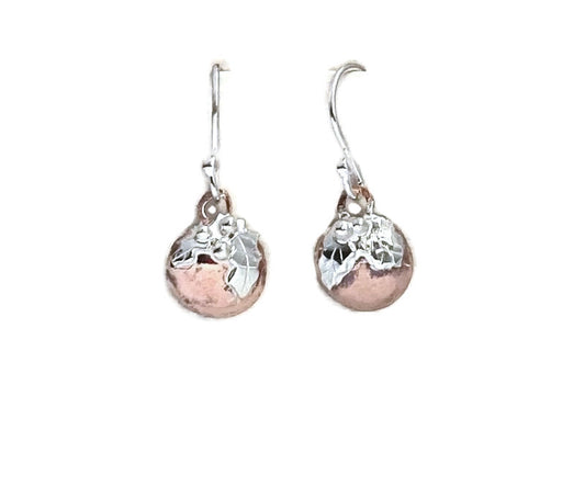 Kim Styles fun festive Christmas pudding earrings in silver and copper with silver holly leaves, on white background
