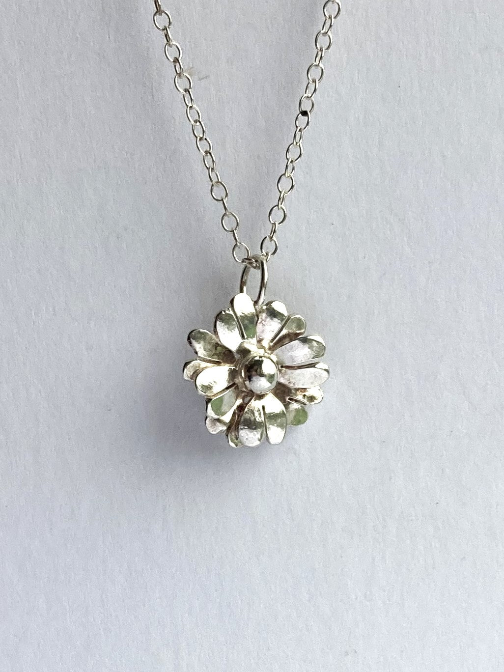 Double Petal Daisy Pendant hand made in sterling silver