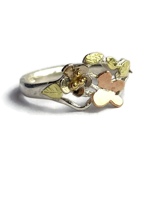 Handmade silver and gold butterfly garden ring with white gold flower, rose gold butterfly and green gold leaves, one-of-a-kind woodland inspired asymmetrical ring