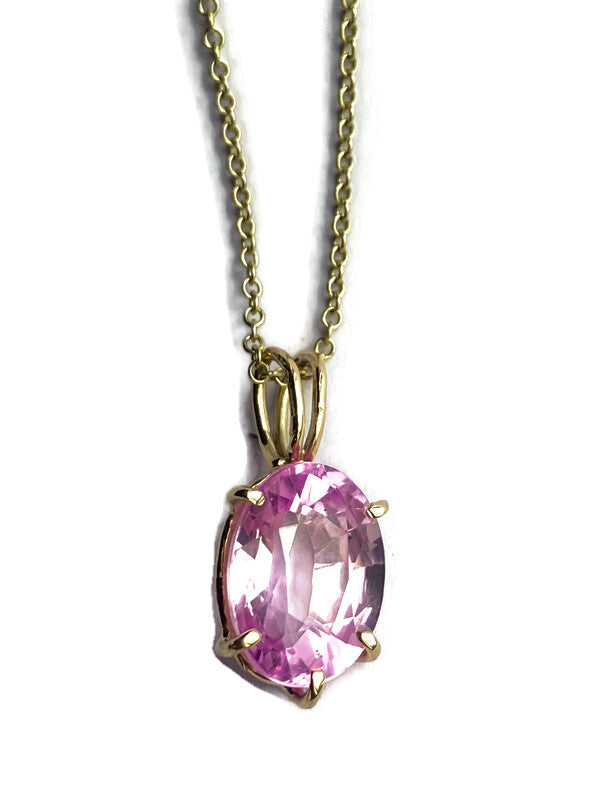 Large oval pink spinel pendant in gold prong setting on 18 inch gold chain, handmade one-of-a-kind gemstone necklace by Kim Styles, with vibrant 11 carat pink spinel