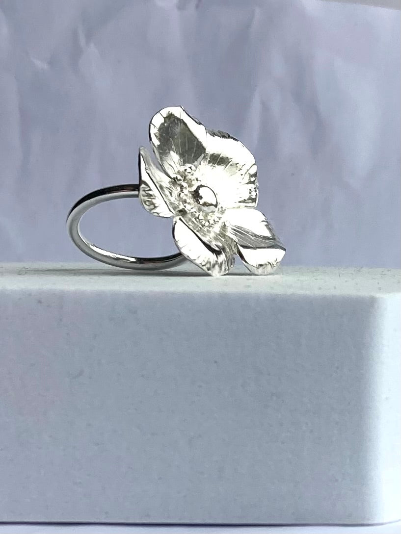 Large silver flower ring by Kim Styles Jewellery on a white background