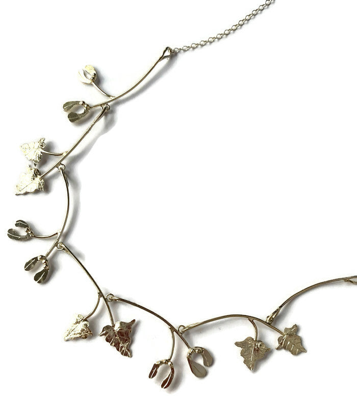 silver handmade necklace with mistletoe and vine leaves
