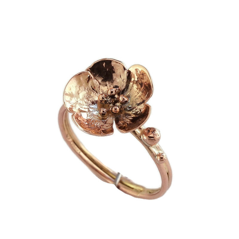 blossom ring in rose gold, on white background