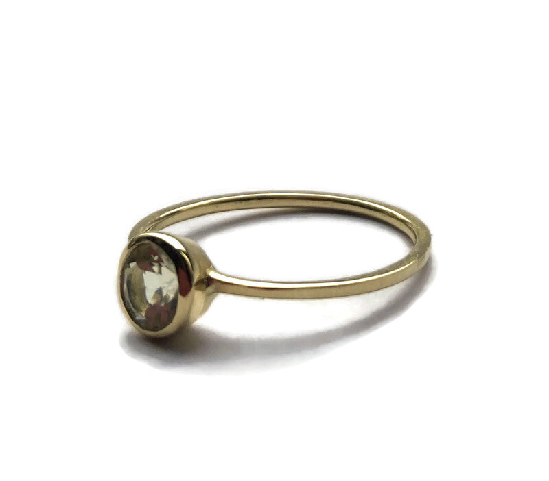 Rich 18 carat yellow gold and beautiful pale apple green beryl solitaire stacking ring with slim shank