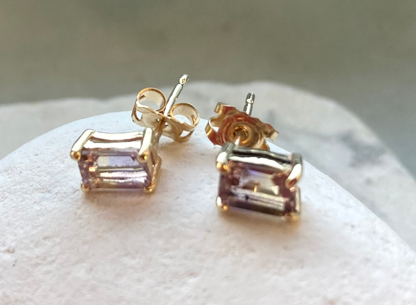 gold oblong earrings set with ametrine